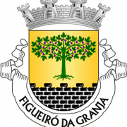 Brasão com coroa, árvore verde e raízes, escudo amarelo e preto